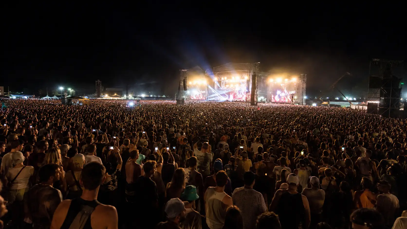 Ella Langley Canada, Three Shows in One Week and Why Toronto Missed Out 2 Massive night-time festival crowd in front of a lit main stage