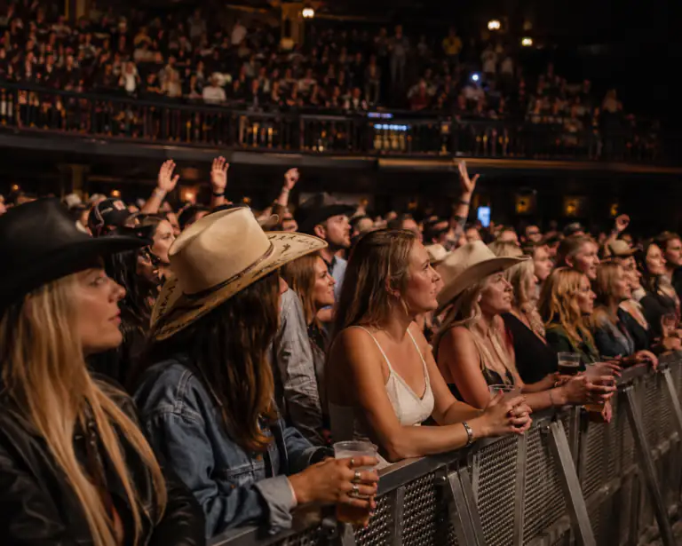 Packed country music concert crowd at the barrier